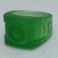 Green plastic ring with a logo on a white background