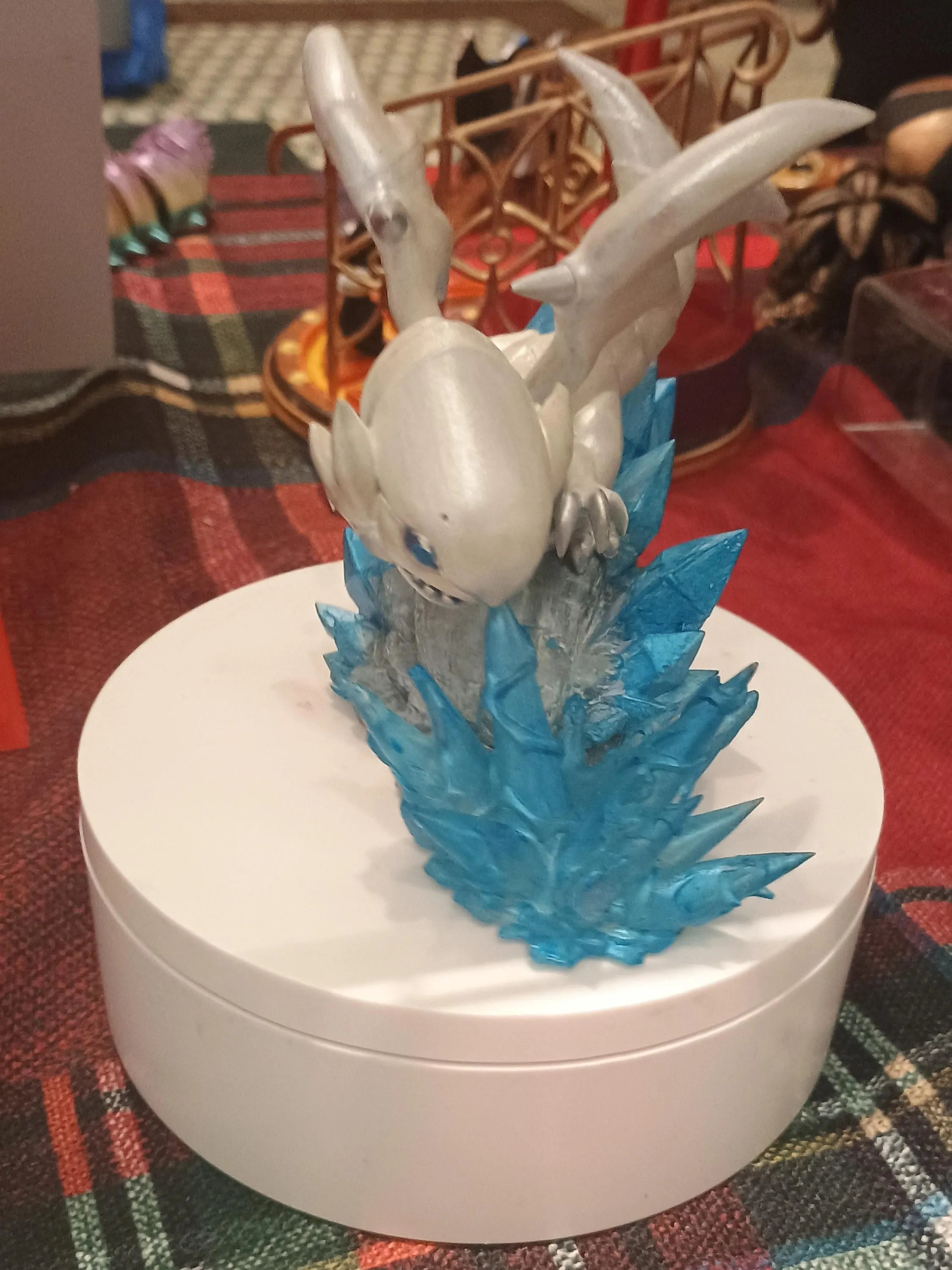 Chibi White Dragon....with blue eyes.